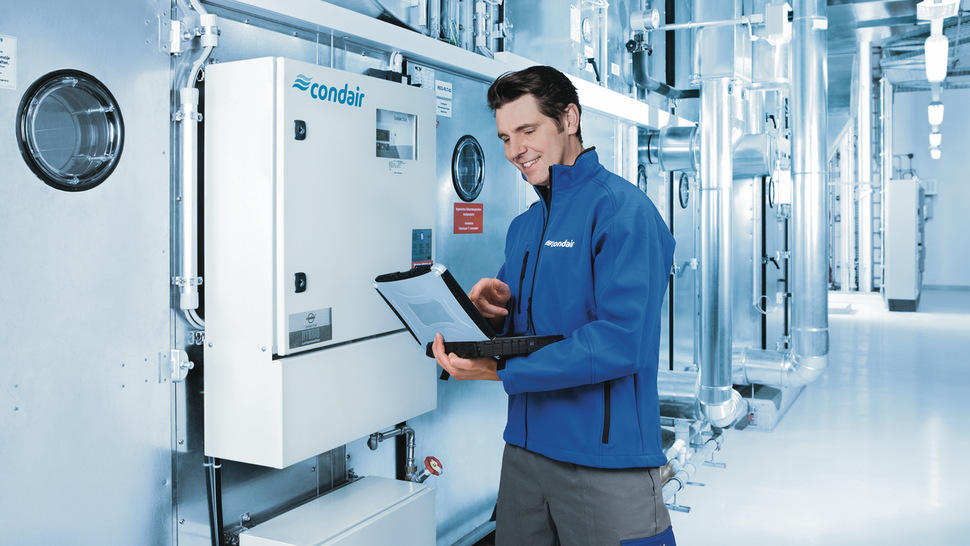 Technician configures a Condair humidity control system